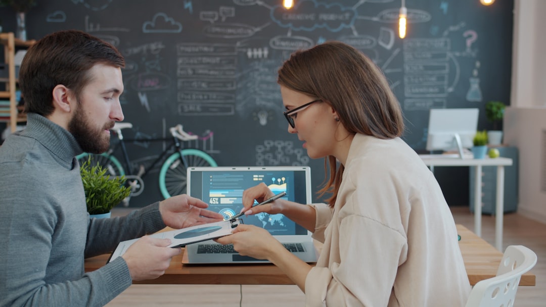 Two teammates collaborating on a product prototype